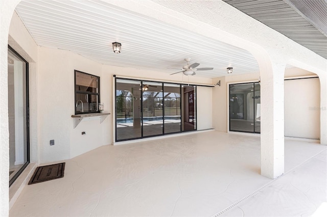 view of patio / terrace with a ceiling fan