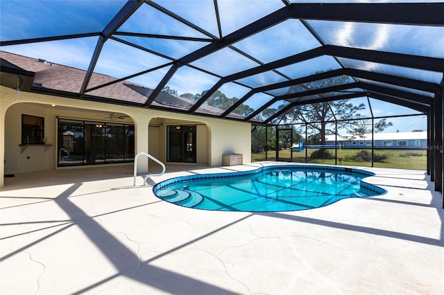 pool with a lanai, a ceiling fan, and a patio