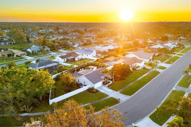 birds eye view of property with a residential view