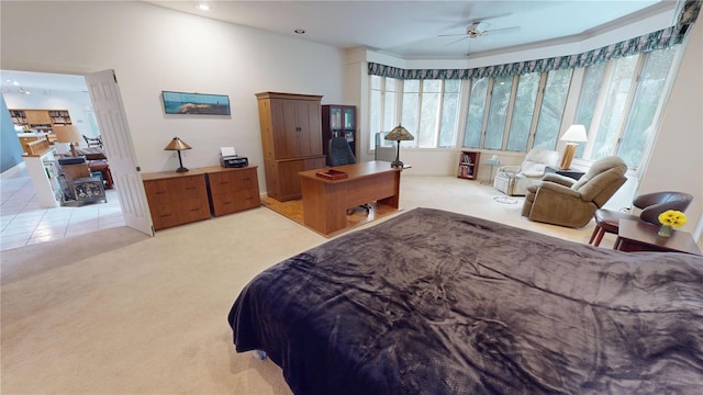 bedroom with light carpet, multiple windows, and recessed lighting