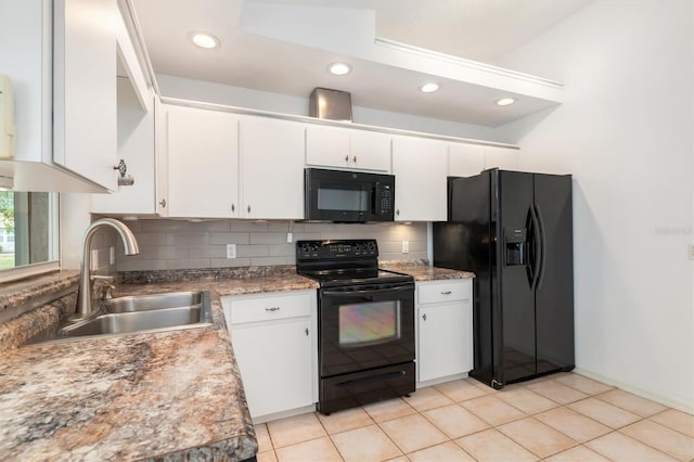 kitchen featuring light tile patterned floors, a sink, decorative backsplash, black appliances, and white cabinets