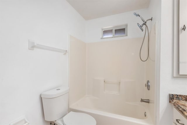 full bath featuring tub / shower combination, toilet, and vanity