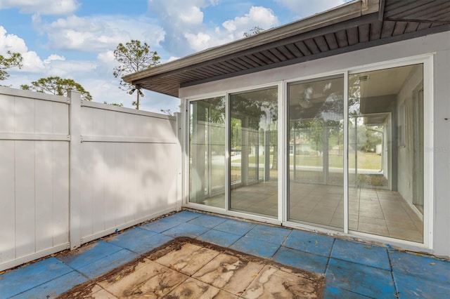 view of patio / terrace featuring fence