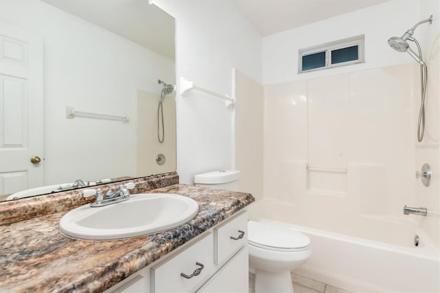 full bathroom with tub / shower combination, toilet, vanity, and tile patterned flooring