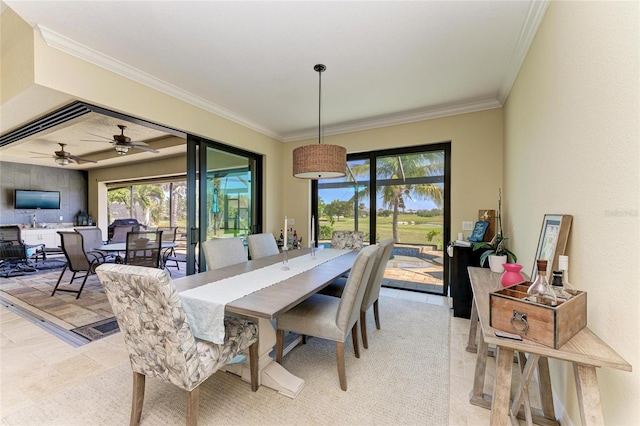 dining area with light tile patterned floors and ornamental molding