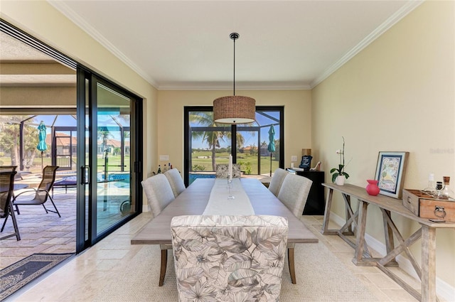 dining area with crown molding, stone finish floor, and baseboards