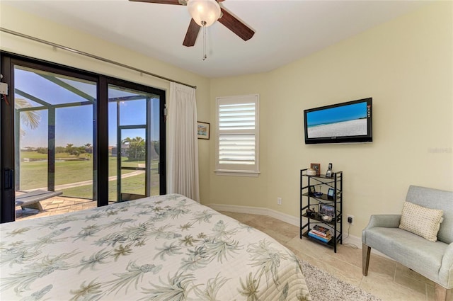 bedroom with baseboards, a ceiling fan, and access to exterior