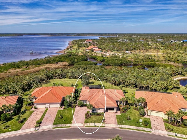 aerial view with a residential view and a water view