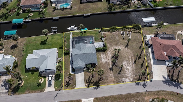 129 Barre Dr NW, Port Charlotte, FL 33952 - bird's eye view with a residential view and a water view