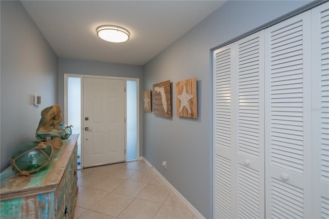 129 Barre Dr NW, Port Charlotte, FL 33952 - interior space featuring light tile patterned floors and baseboards
