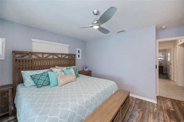 129 Barre Dr NW, Port Charlotte, FL 33952 - bedroom featuring a ceiling fan, wood finished floors, visible vents, and baseboards