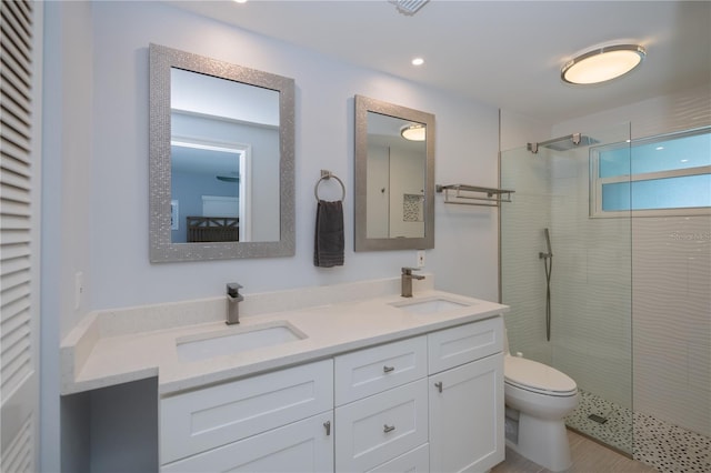 129 Barre Dr NW, Port Charlotte, FL 33952 - bathroom featuring a sink, toilet, and a walk in shower