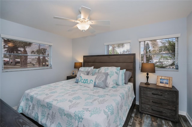 129 Barre Dr NW, Port Charlotte, FL 33952 - bedroom featuring a ceiling fan, baseboards, and wood finished floors