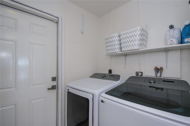 129 Barre Dr NW, Port Charlotte, FL 33952 - washroom featuring laundry area and washing machine and dryer