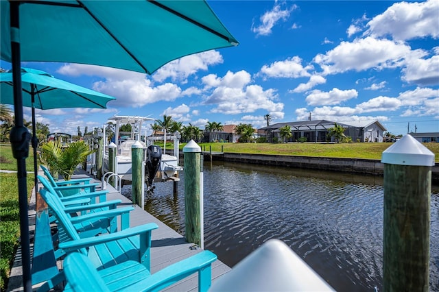 129 Barre Dr NW, Port Charlotte, FL 33952 - dock area featuring a water view and boat lift