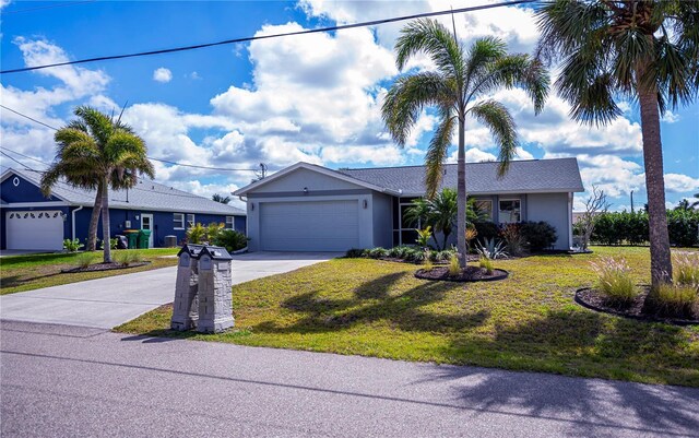 129 Barre Dr NW, Port Charlotte, FL 33952 - ranch-style house with a garage, driveway, a front lawn, and stucco siding