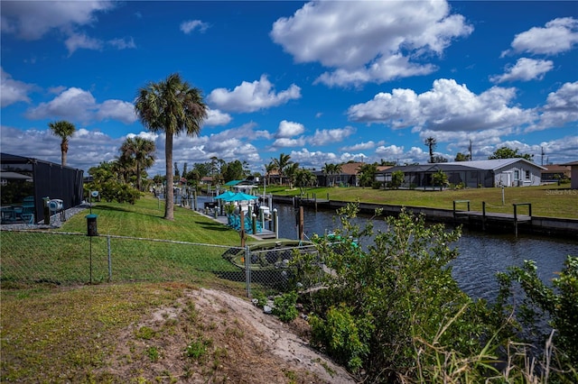 129 Barre Dr NW, Port Charlotte, FL 33952 - view of water feature with a boat dock and fence
