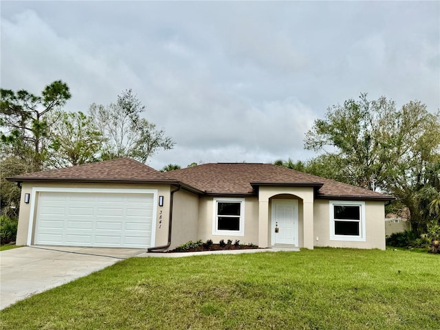 single story home with a front yard, driveway, an attached garage, and stucco siding