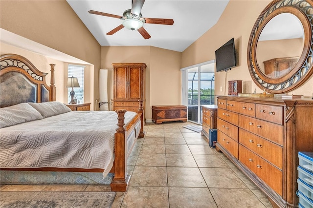 bedroom featuring lofted ceiling, light tile patterned flooring, and baseboards