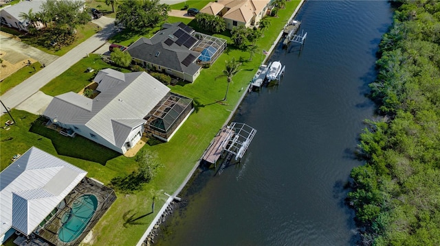 drone / aerial view with a water view