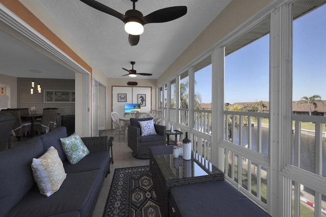 sunroom / solarium with ceiling fan