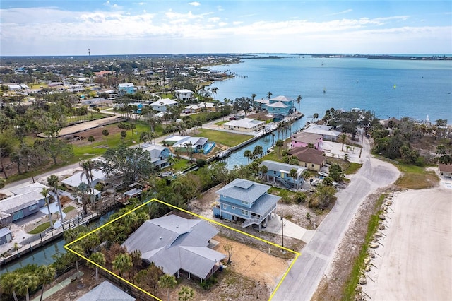 aerial view featuring a water view and a residential view