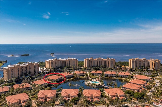 aerial view with a water view and a view of city