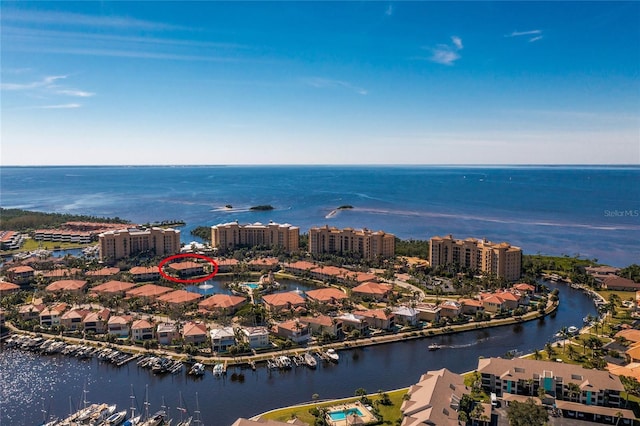 aerial view featuring a water view and a city view