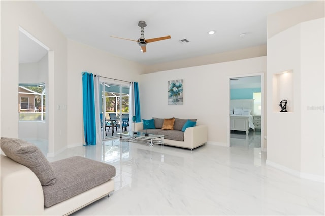 living area with marble finish floor, recessed lighting, visible vents, a ceiling fan, and baseboards