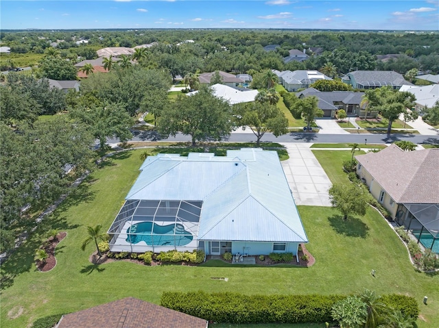 birds eye view of property with a residential view