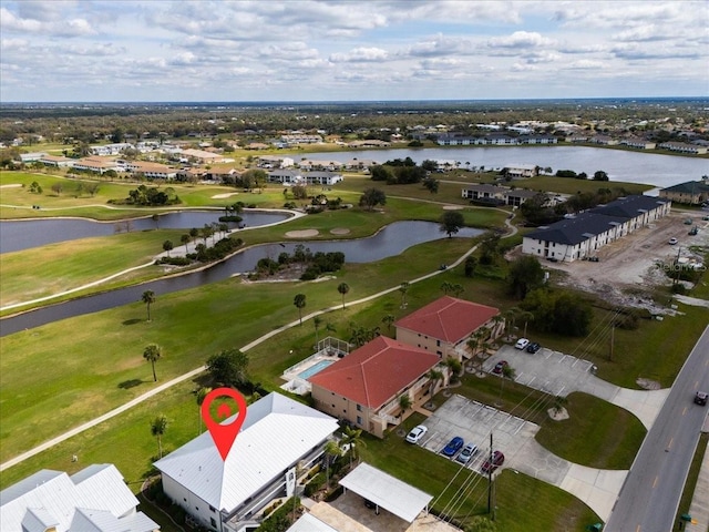 aerial view with a residential view and a water view