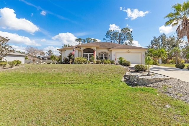 view of front facade featuring driveway, a front yard, an attached garage, and stucco siding