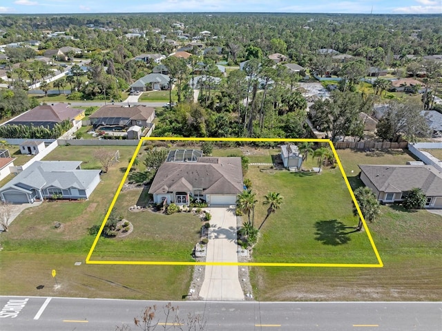 birds eye view of property with a residential view