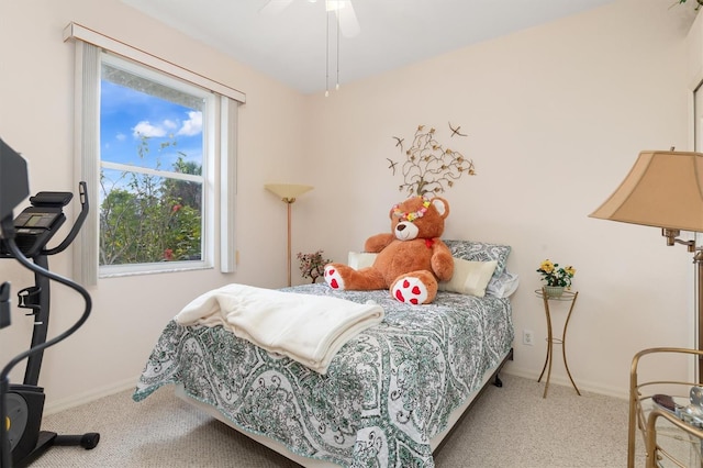 bedroom featuring ceiling fan, carpet flooring, and baseboards