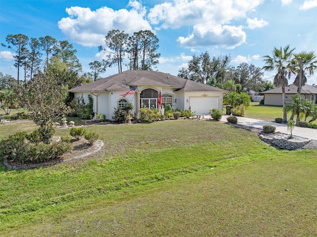 single story home with a garage, a front yard, concrete driveway, and stucco siding