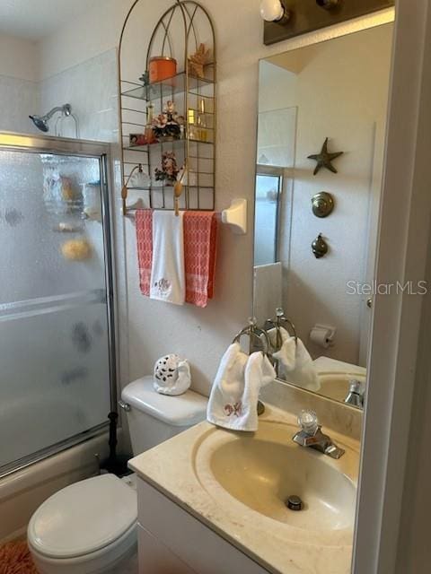 3816 N Cranberry Blvd, North Port, FL 34286 - full bath with vanity, toilet, and bath / shower combo with glass door
