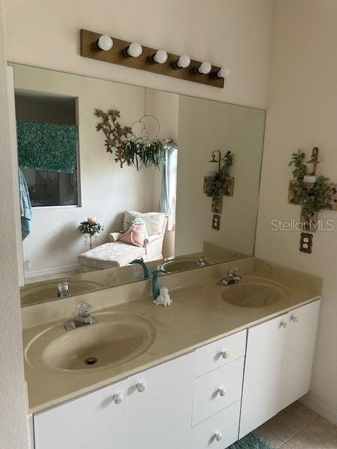 3816 N Cranberry Blvd, North Port, FL 34286 - full bath featuring double vanity and tile patterned floors