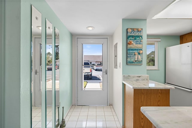 interior space featuring light tile patterned floors