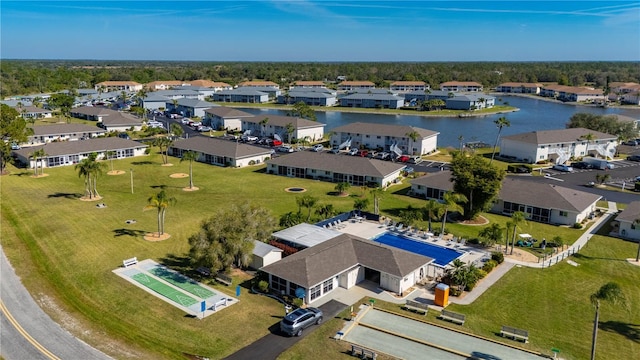 aerial view with a water view and a residential view