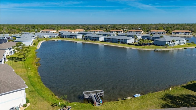 aerial view with a residential view and a water view