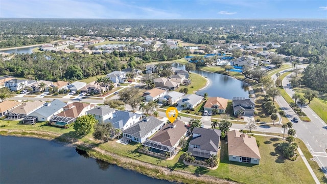 aerial view with a water view and a residential view