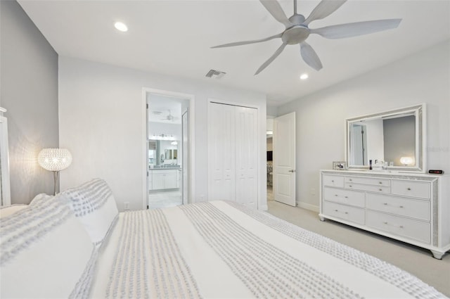 bedroom featuring ensuite bathroom, a closet, visible vents, and recessed lighting