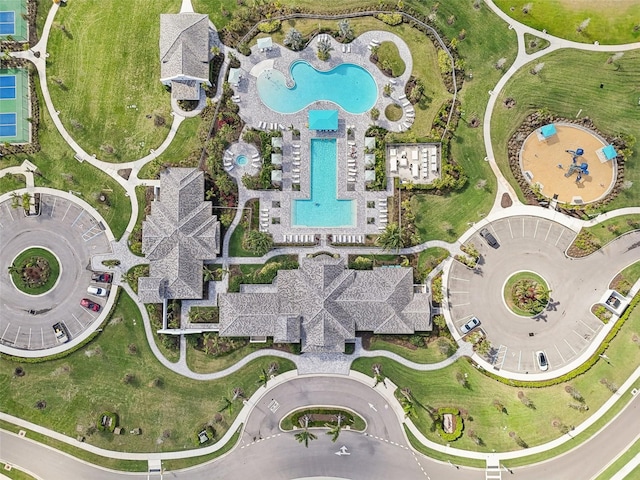 view of property location with a pool area
