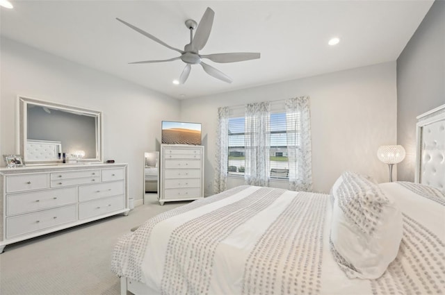 bedroom with light colored carpet, recessed lighting, and ceiling fan