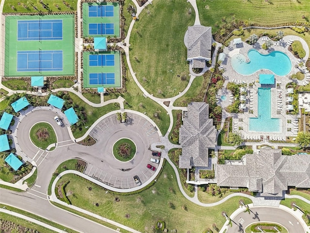 aerial view of property's location featuring a pool area