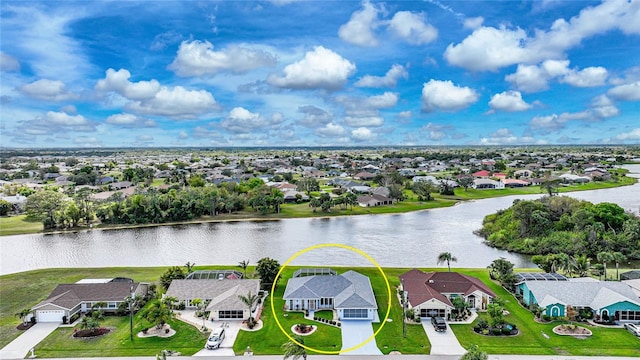 aerial view featuring a water view and a residential view