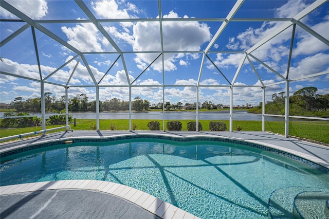 pool with glass enclosure and a water view