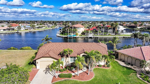 aerial view featuring a water view and a residential view