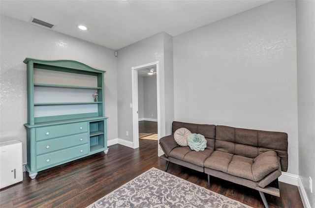 living room with wood finished floors, recessed lighting, baseboards, and visible vents