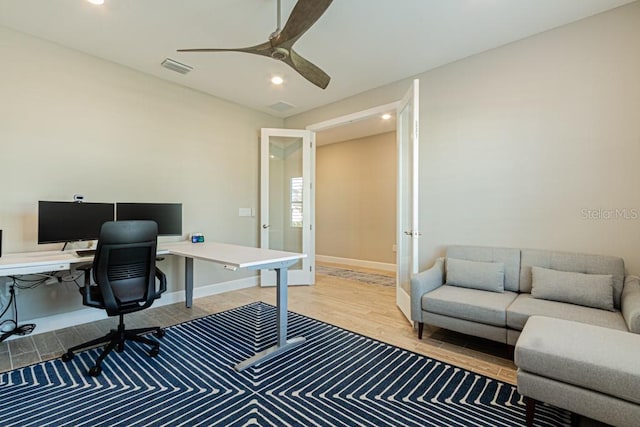 office featuring ceiling fan, recessed lighting, wood finished floors, visible vents, and baseboards